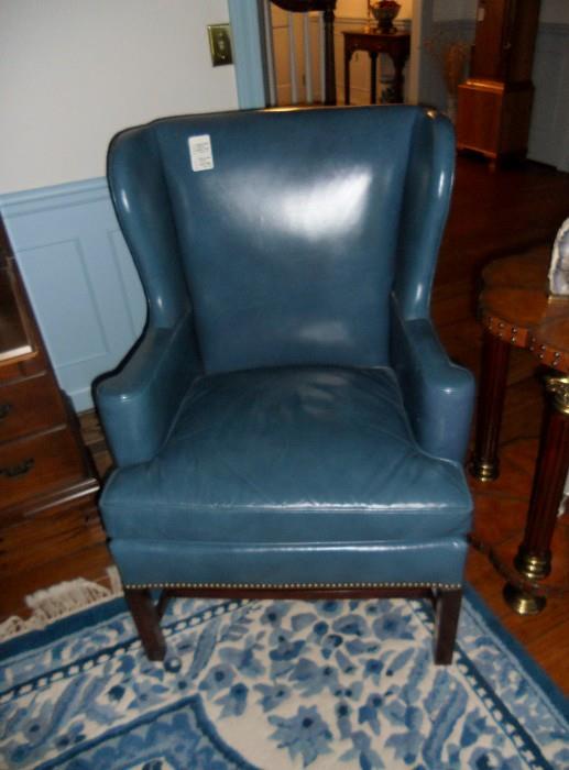 One of 2 fantastic blue leather chairs with studs by Hickory Chair