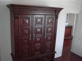 carved media cabinet, matches the king bed