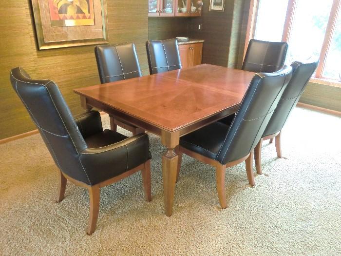 Dining set with 8 chairs and 2 leaves by Stanley. Like new condition.