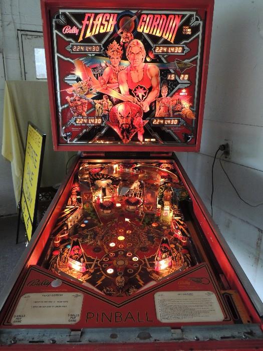 Vintage Flash Gordon pinball machine, COMPLETE - can be played as-is or with minor tune-up, includes all factory manuals, extra service parts, light bulbs, extra drop targets, fuses, etc. (note we removed the glass and front rail just for better pictures)