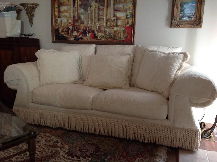 White Upholstered Pillow Back Sofa