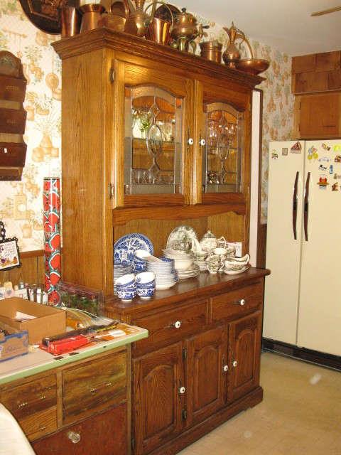 Nice china cabinet with leaded glass doors and light
