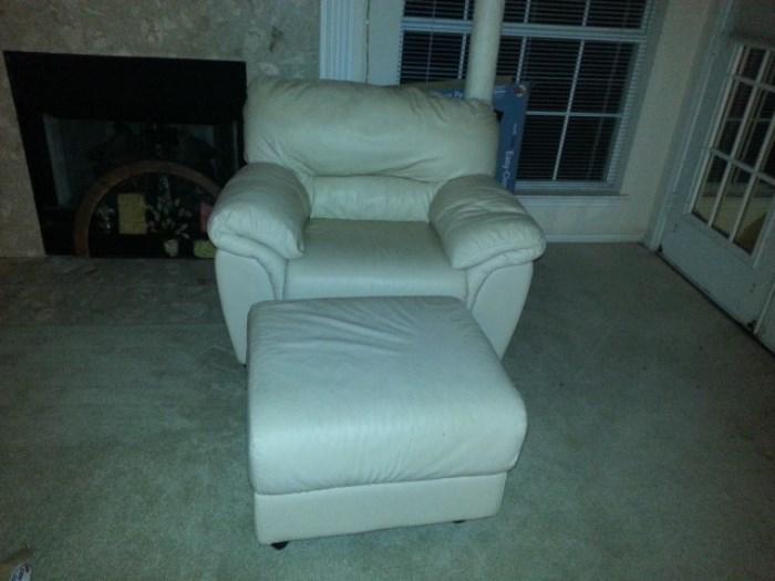 Beautiful White leather Couch, Loveseat, Chair,, Ottoman. Excellent condition. Couch still has tag on it.