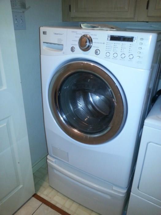 LG Front Loading Steam Washer with Base Mint condition.. LOW Mileage. Homeowner lived alone. No kids.