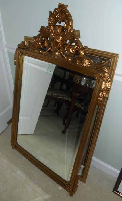 Large beveled ornate gold leaf mirror