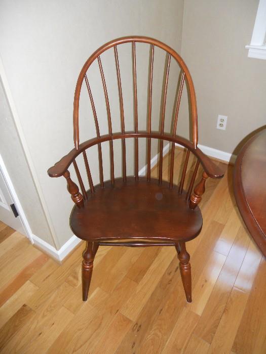 One of 4 Cherry Windsor Chairs with arms