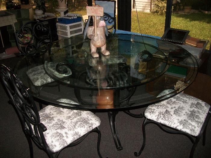 TABLE (HAS 2 ROUND TOPS) & 4 IRON CHAIRS
