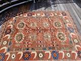 Several real Persian rugs of various sizes