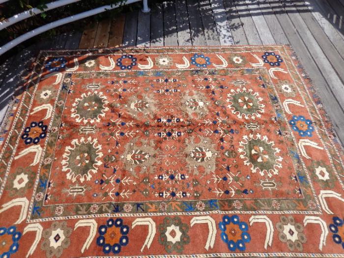 Several real Persian rugs of various sizes