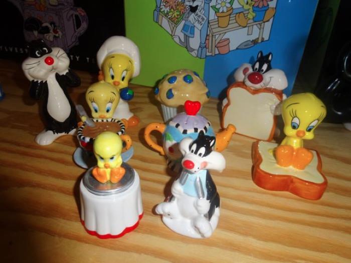 More adorable, collectible salt & pepper shakers. I love the one of Tweety on serving dish sitting on the table with Sylvester salivating while he sharpens his carving knife. Gotta luv 'em!