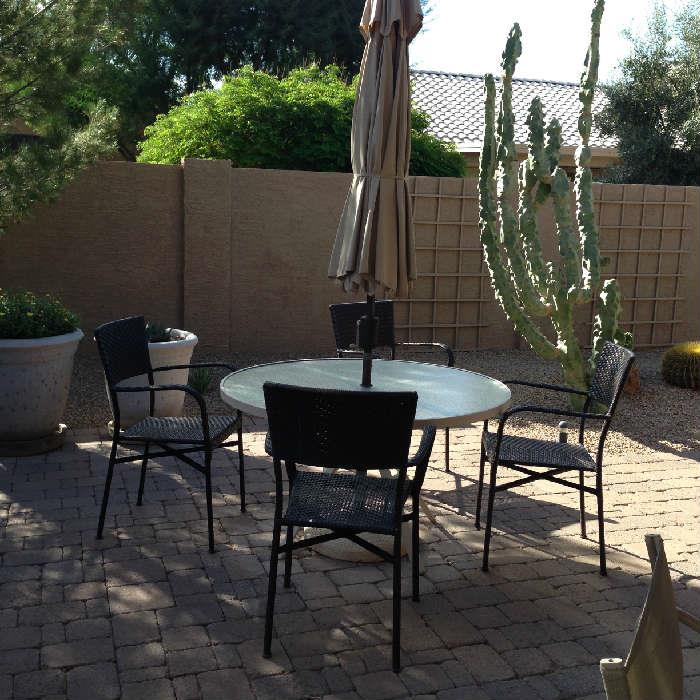 Round Glass Top Patio Table, Umbrella, four chairs