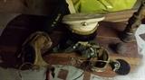 Much military, including uniforms, hats, leather pilot's caps-even a Civil War cannon ball.