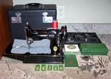 Singer Model 221-1 Featherweight sewing machine, 1948, Serial #AH553258, with accessories