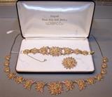 Stunning F. L. Thorpe Black Hills Gold parure with necklace, bracelet, and pendant/pin.