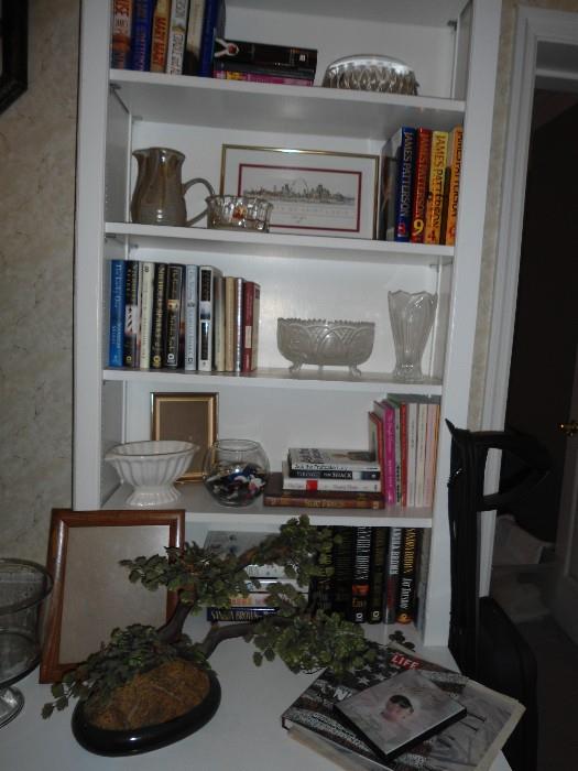 Several Bookcase just FULL of items, Glassware, Books, vases, DVD's, Tapes, Small electronics, etc..