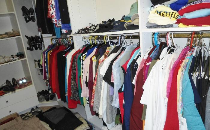 Right side of closet FULL, hats, shoes in the floor area an round circular shoe rack...JUST FULL of great items..