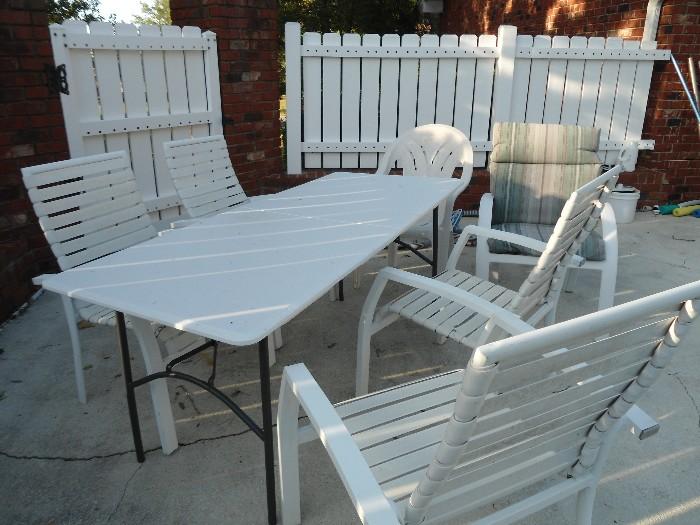 More outdoor furniture, chairs, tables, etc.