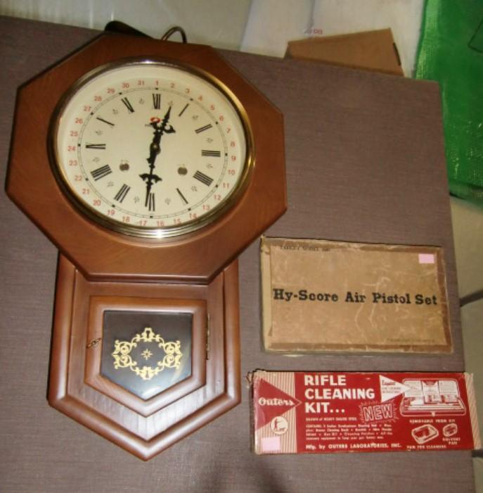 wall clock, rifle cleaning kit