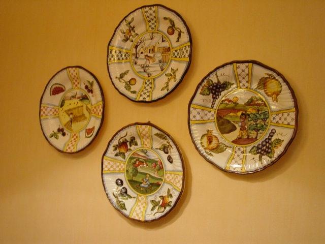 Group of Four Farming Seasons plates (Vietri).