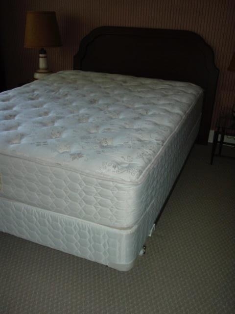 Queen headboard and box springs with frame.  (Mattress is not included in sale)