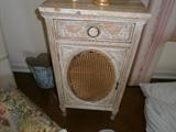 close up of French marble top night stands