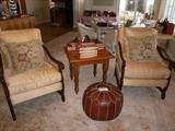 pair of wonderful arm chairs designed by Vallone interiors & accent table With a leather ottoman