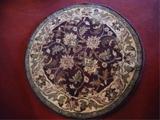 NEW NEVER USED ROUND WOOL RUG