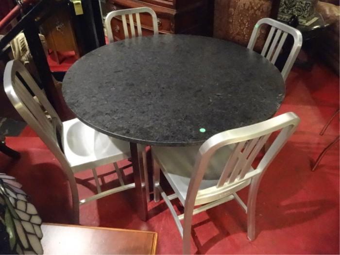 4 ALUMINUM EMECO CHAIRS WITH ALUMINUM AND STONE TOP DINING TABLE