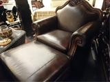 LEATHER ARMCHAIR WITH OTTOMAN