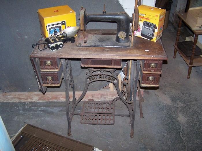 OLD TREADLE SEWING MACHINE