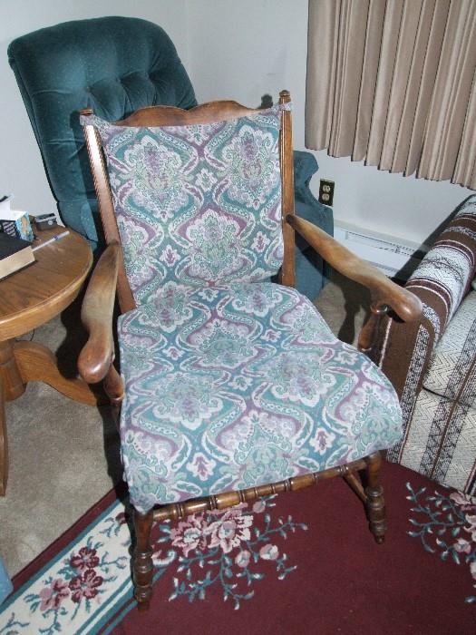 ANTIQUE SITTING CHAIR WITH BLUES/GREENS PADS. MATCHING ROCKER AVAILABLE