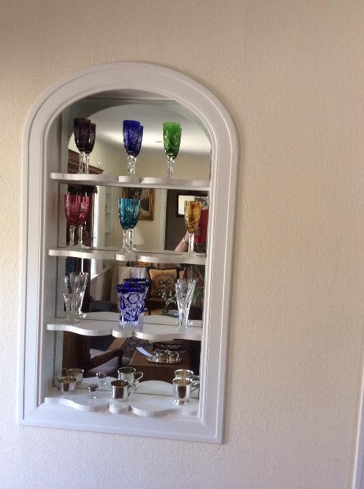 Gorgeous colored crystal stemware and vases. 