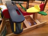 Rare, Robert McClough wooden rocking airplane! Who wants to put this under the tree?