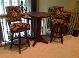 Round Pub Table and Two Swivel Upholstered Pub Chairs