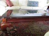 Glass top coffee table and rug
