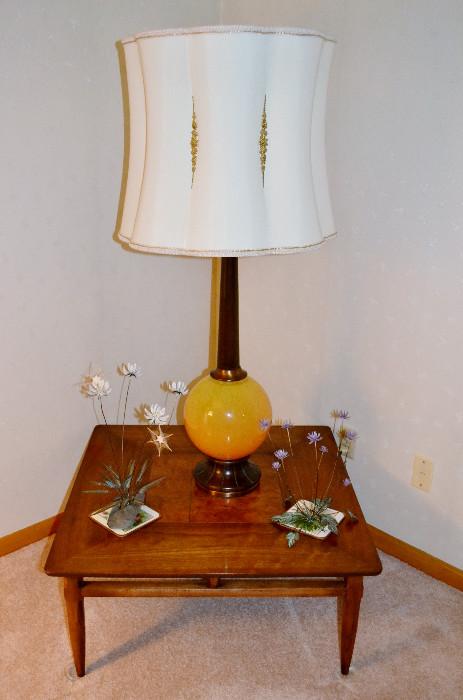 Lane Coffee Table, Glass Ball Lamp, Metal Flower Sculptures