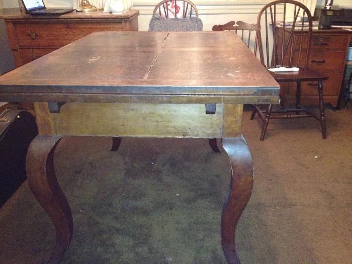 Antique dining room table - two extended leaves are included.