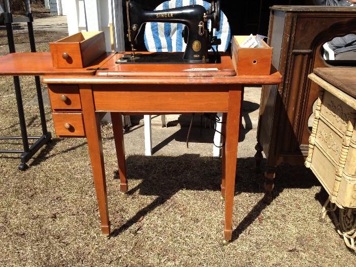 Singer sewing machine (circa 1945) with light oak cabinet