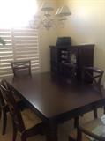 Wood table, 2 leaves and 6 chairs from Mathis Brothers with matching china cabinet