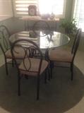Dinette set and blue area rug