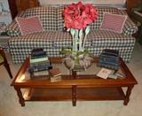 Green Plade Sofa, Glass Top Coffee Table