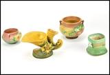 Group of four Roseville Pottery pieces,
tallest (Cornucopia) is 5.5 in.
Auction estimate: $100 - 200