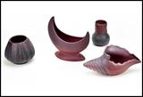 Group of four vintage Van Briggle Pottery pieces,
tallest (Crecent moon) is 7.5 in.
Auction estimate: $200 - 400