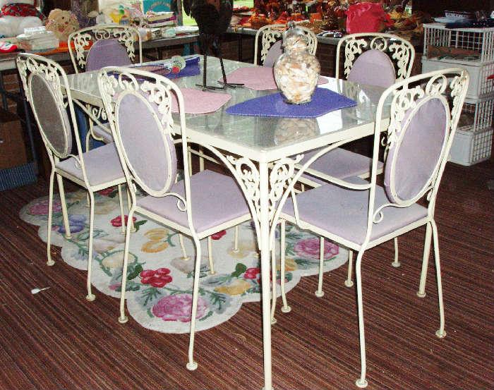 nice white iron table and 6 chairs