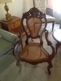 1 of a pair of Carved Victorian Caned Arm Chairs