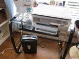 Contemporary computer desk, printer, shredder, and keyboard