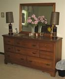 Dresser with mirror, measures 61" long x 18"d x 32"t + mirror is extra 32"t on top-it's a 2-tone piece, top is a lighter color that seen in this photo 