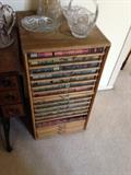 Antique spool cabinet with lots of wood spool thread