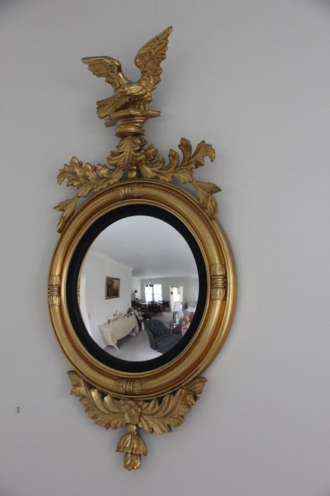 Vintage convex "bullet" mirror with eagle finial