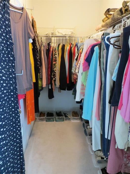 Closet full of women's clothing and shoes